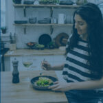 woman getting to eat a healthy dinner after a long day at home